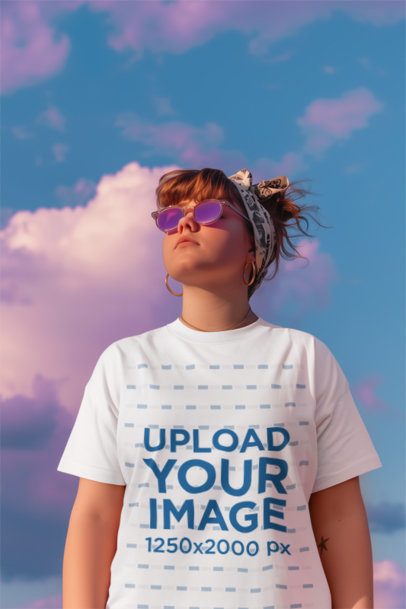 Round-Neck Tee Mockup Featuring an AI-Created Woman With Sunglasses Posing Against the Sky