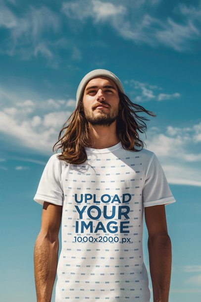 T-Shirt Mockup Featuring an AI-Created Bearded Man Posing Against the Sky
