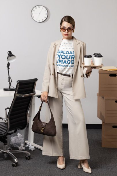 Bella Canvas T-Shirt Mockup Featuring a Corporate Woman Posing in an Office m55714