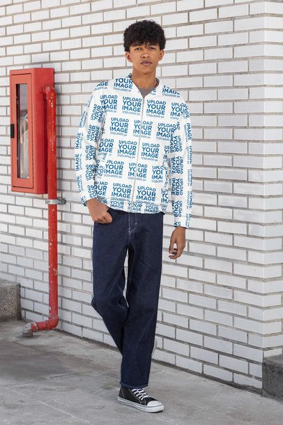 Bomber Jacket Mockup Featuring a Curly-Haired Man Walking in the Street
