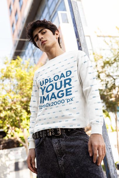 Comfort Colors Mockup Featuring a Serious Man Wearing a Sweatshirt With Customizable Sleeves in the Street m55825