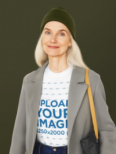 T-Shirt Mockup of an AI-Generated Smiling Old Woman Standing in a Studio