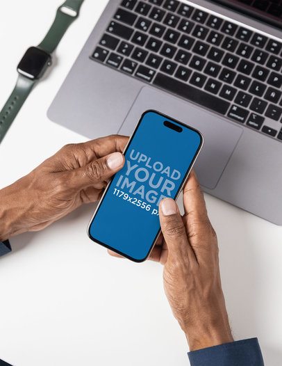 Digital Mockup Featuring a Man Using an iPhone 16 in a Corporate Environment m55720