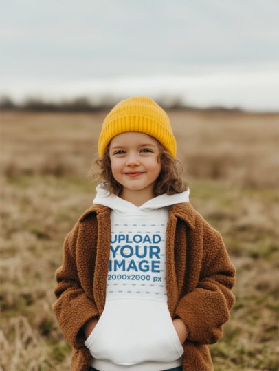 Hoodie Mockup Featuring an AI-Created Cheerful Little Girl Posing Outdoors m56044