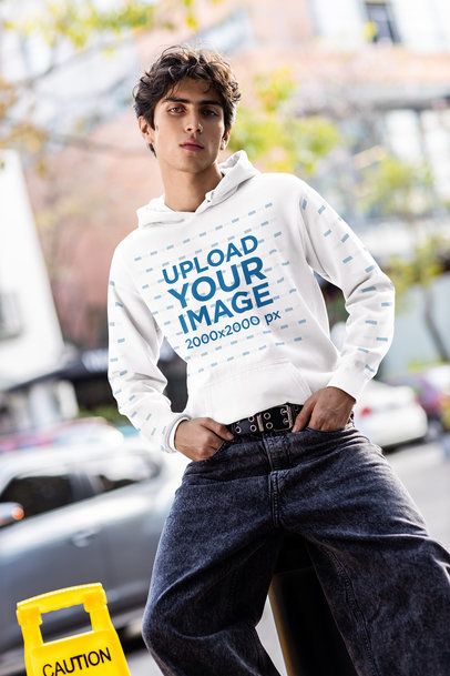 Comfort Colors Mockup Featuring a Man Wearing a Hoodie With Sleeves in an Urban Setting m55827