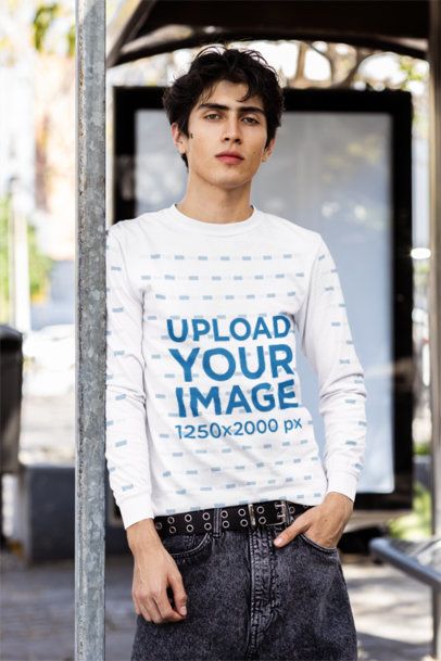 Comfort Colors Mockup of a Serious Man Wearing a Long-Sleeve Tee While Standing in a Bus Stop m55821 