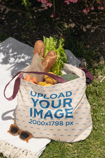 Econscious Mockup Featuring a Tote Bag Placed on the Floor With Some Groceries  m56493
