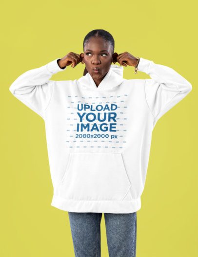 Pullover Hoodie Mockup of a Woman Doing a Funny Pose Against a Colorful Background