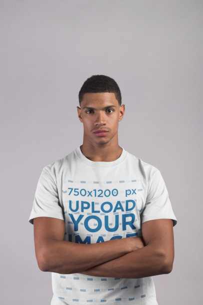 Front Shot Mockup of a Man Wearing a T-Shirt Against a White Background