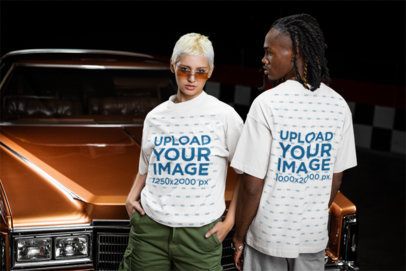 Oversized T-Shirt Mockup Featuring a Man and a Woman Posing in a Garage m56274