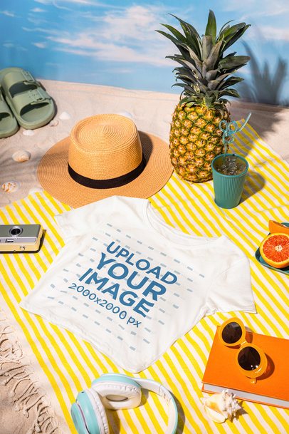 Bella Canvas Mockup Featuring a Crop Top Lying in a Beach Picnic m56223