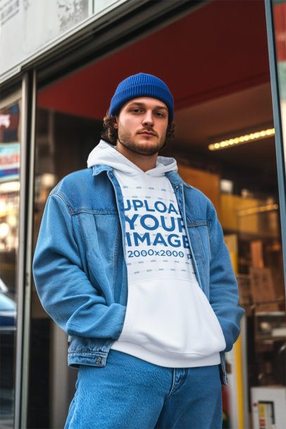 Pullover Hoodie Mockup of an AI-Generated Bearded Man Standing Outside a Store m56371