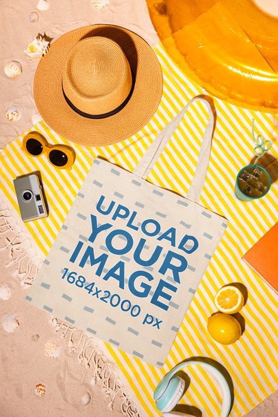 Summer Mockup Featuring a Tote Bag Placed on a Beach Picnic Setting m56217