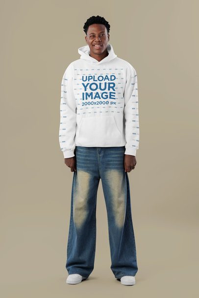 Pullover Hoodie Mockup of a Man Smiling and Winking in a Studio