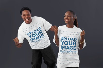 Oversized Round-Neck Tee Mockup Featuring a Joyful Man Posing With a Woman in a Studio