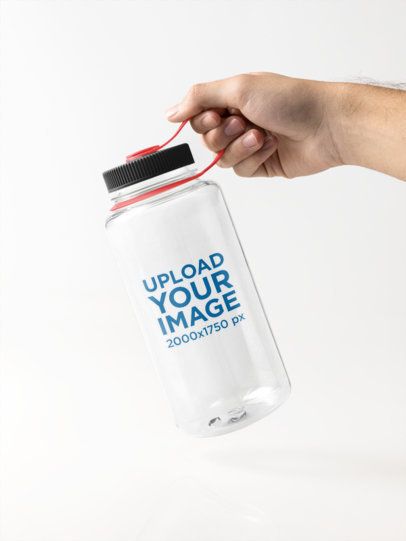 Nalgene Mockup Featuring a Person's Hand Carrying a Water Bottle in a Studio m55021