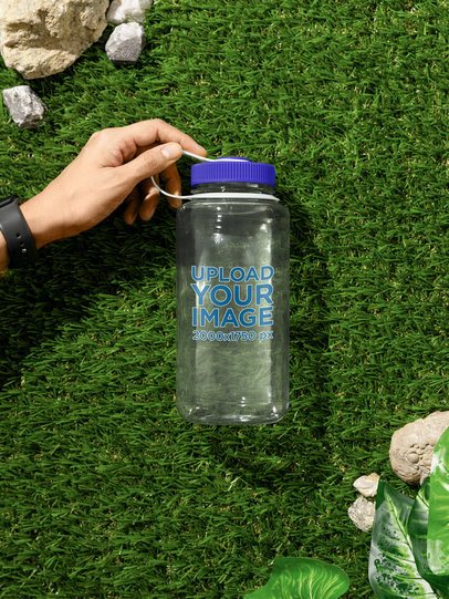 Nalgene Mockup Featuring a Man's Hand Holding a Water Bottle  m55030