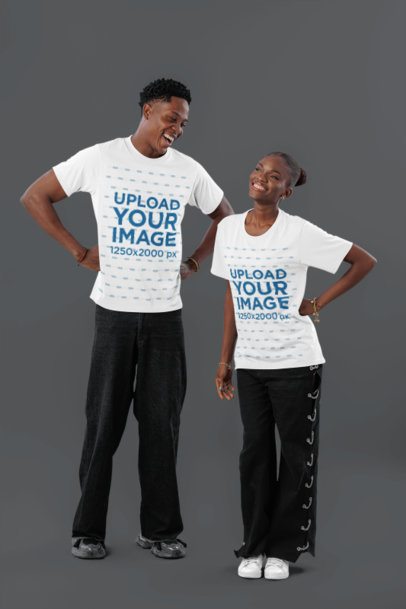 Round-Neck Tee Mockup of a Happy Man and a Woman Standing Against a Colorful Backdrop