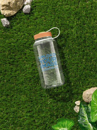 Nalgene Mockup Featuring a Water Bottle Lying on the Grass m55029