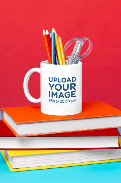Mockup of a Sublimated Coffee Mug Filled With Colors and School Supplies