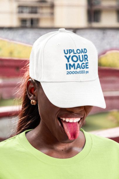 Embroidered Dad Hat Mockup of a Woman Showing Off Her Tongue 