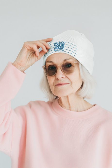 Beanie Mockup of an AI-Generated Smiling Senior Woman Posing in a Studio