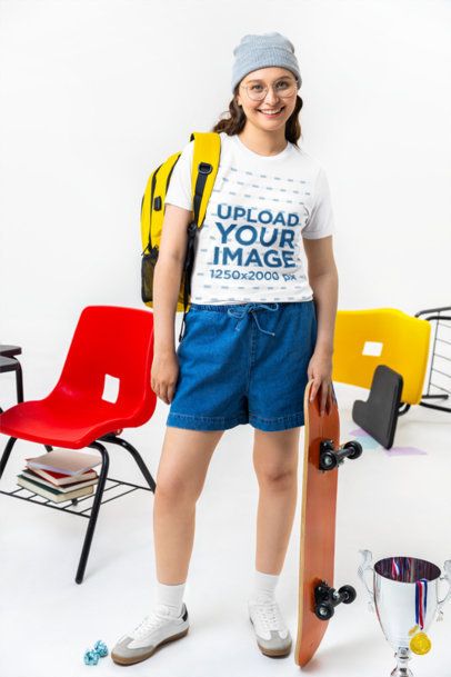 Bella Canvas T-Shirt Mockup of a Smiling Young Woman Student Posing in a Classroom Setting