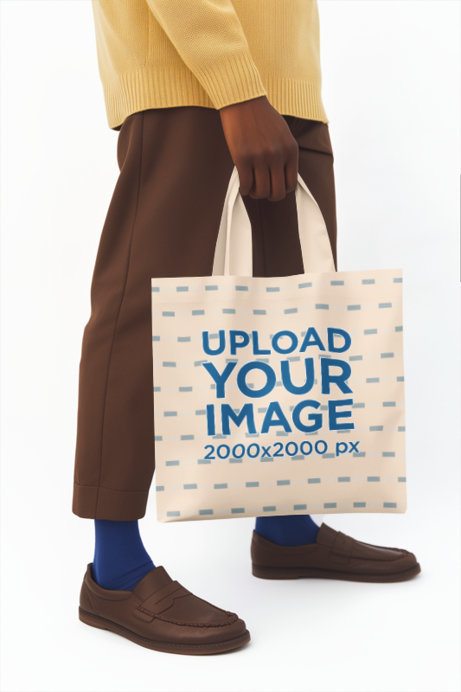 Mockup of an AI-Generated Person Posing in a Studio While Holding a Tote Bag