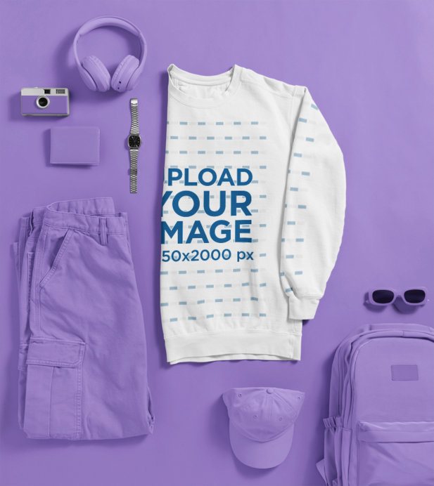 Mockup of a Comfort Colors Sweatshirt Lying on a Colorful Surface With Daily Objects