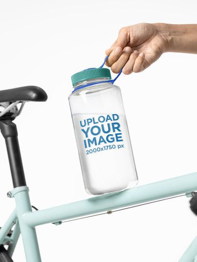 Nalgene Mockup Featuring a Person Putting a Water Bottle on a Bike m55026