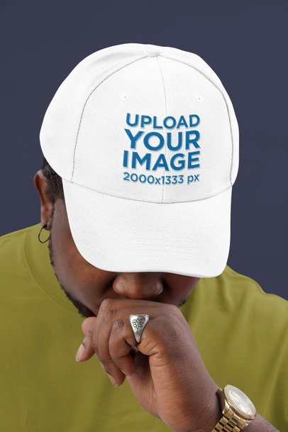 Dad Hat Mockup Featuring a Bearded Man Posing in a Studio With a Ring on His Finger