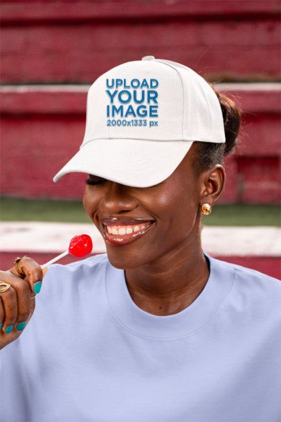 Dad Hat Mockup Featuring a Happy Woman Eating a Lollipop