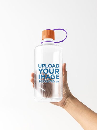 Mockup of a Person Holding a Nalgene Water Bottle in a Studio m55022