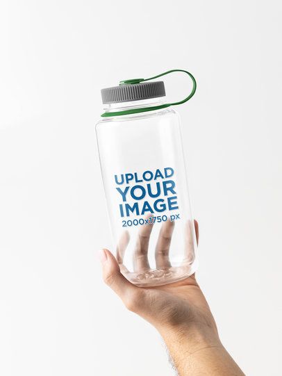 Nalgene Mockup Featuring a Person's Hand Holding a Water Bottle in a Studio m55020
