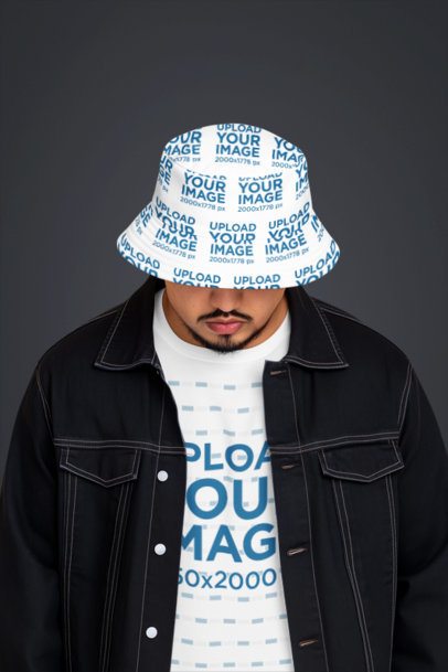 Sublimated Bucket Hat and T-Shirt Mockup of an AI-Generated Bearded Man Posing in a Studio m54243