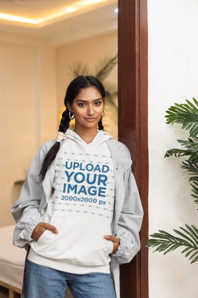 Pullover Hoodie Mockup of a Woman With Braids Posing in a Bedroom Entrance m55439