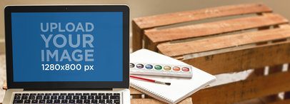 Laptop Mockup of a Macbook Pro at an Art Studio