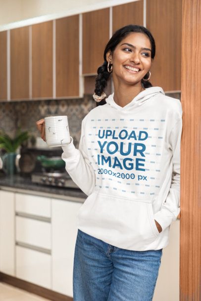 Pullover Hoodie Mockup Featuring a Happy Woman Posing in the Kitchen m55442