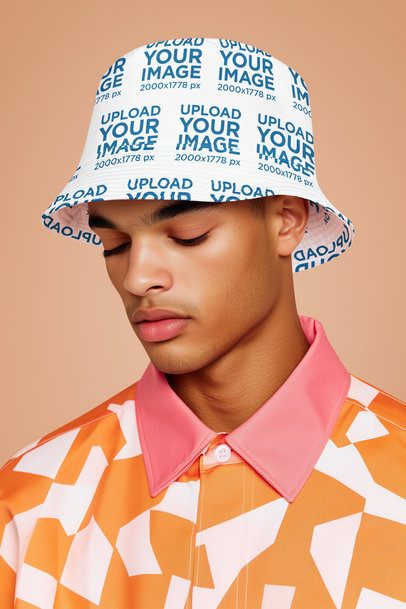 Bucket Hat Mockup of an AI-Generated Man Posing in a Studio With a Colorful Background m54246