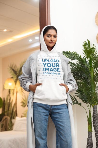 Pullover Hoodie Mockup Featuring a Woman Standing Outside of a Bedroom m55440