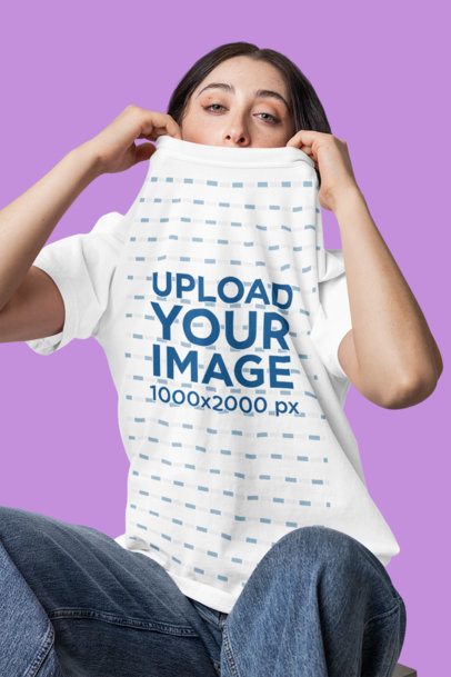 Comfort Colors Mockup of a Woman Covering Half Her Face With a T-Shirt in a Studio m57429