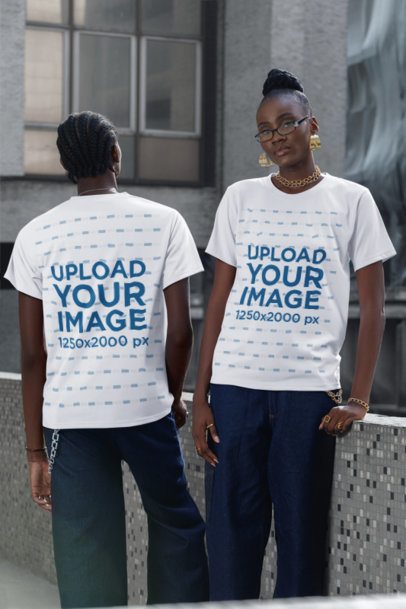 Round-Neck Tee Mockup of a Woman and a Man Posing in the Street With a Serious Look