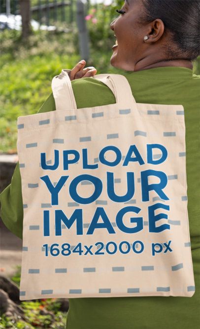 Mockup Featuring a Cheerful Woman Carrying a Tote Bag on Her Back