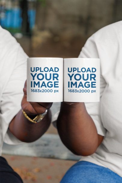 Mockup Featuring a Man's and a Woman's Hands Clinking Coffee Mugs