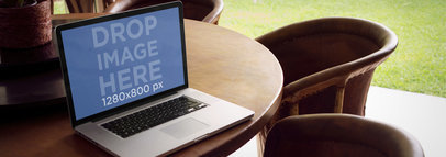 Laptop Mockup of a MacBook on Outdoor Patio Dining Table