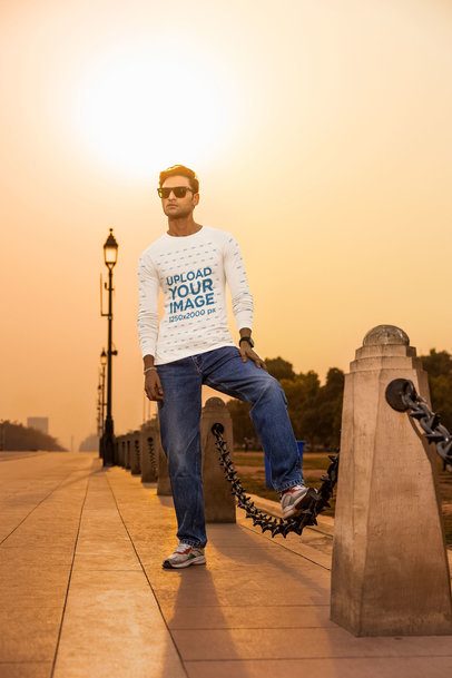 Bella Canvas Mockup Featuring a Man Posing With a Long-Sleeve Tee in a Nice Street m56791