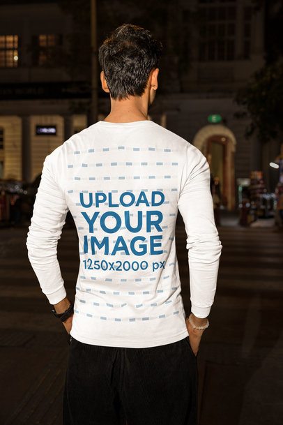 Back-View Mockup of a Man in a Bella Canvas Long-Sleeve Tee Standing in the Street m56887