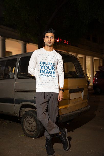 Sweatshirt Mockup of a Serious Man Standing Against a Van in the Night m56861