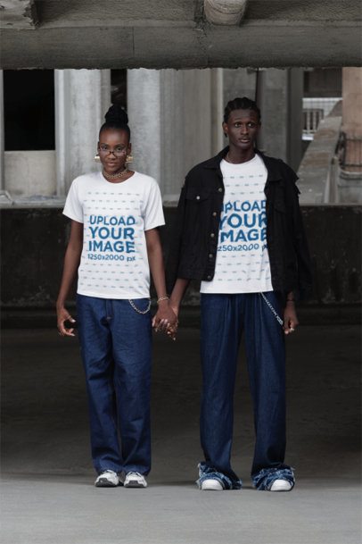 Round-Neck T-Shirt Mockup Featuring a Man and a Woman Holding Hands in an Urban Setting