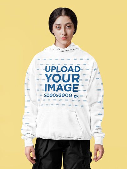 Comfort Colors Hoodie Mockup of a Woman Standing Against a Studio Setting m57414